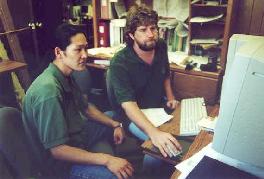 Yongchan Park and Tim Thibault enter mapping data collected in the field.